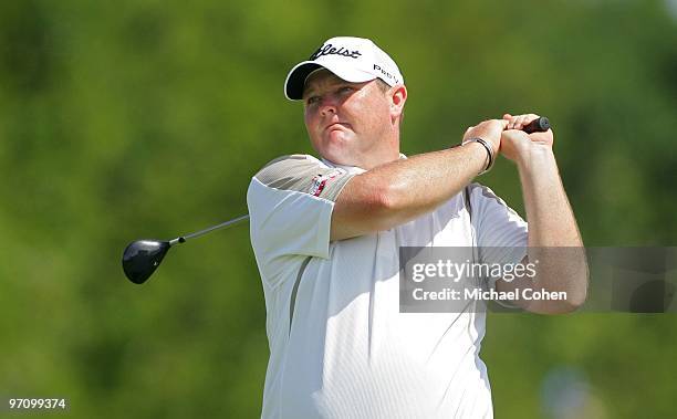 Jarrod Lyle of Austrailia hits a shot during the third round of the Mayakoba Golf Classic at El Camaleon Golf Club held on February 20, 2010 in...