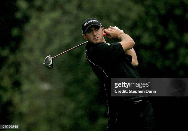 Dustin Johnson hits his tee shot on the 12th hole during the second round of the Northern Trust Open at Riviera Country Club on February 5, 2010 in...