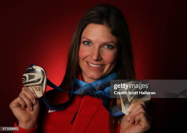 Alpine skier Julia Mancuso of the United States poses with her silver medals for the ladies' downhill and ladies' super combined in the NBC Today...