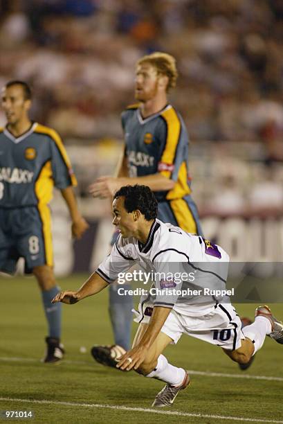 Landon Donovan of the San Jose Earthquakes loses his footing against the Los Angeles Galaxy during the second half at the Rose Bowl on July 4, 2002...