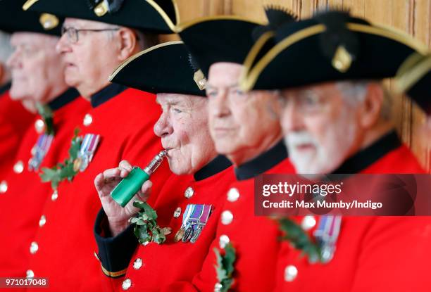 Chelsea Pensioner seen vaping ahead of the annual Founder's Day Parade at the Royal Hospital Chelsea on June 7, 2018 in London, England. Founder's...