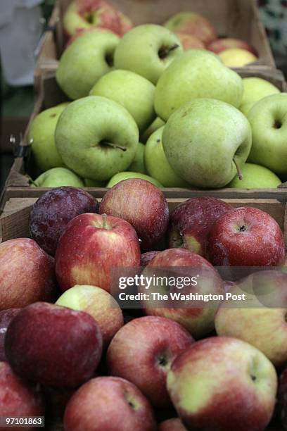 Anacostia, Washington, DC A variety of apples from D&S Farm including Empire, foreground, and Mutsu, background, are set out for sale at the Capital...