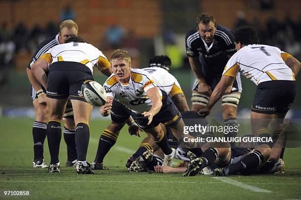 South Africa 'Brumbies scrumhalf Josh Valentine opens up on February 26, 2010 during the Super14 rugby match between Stormers and Brumbies at...