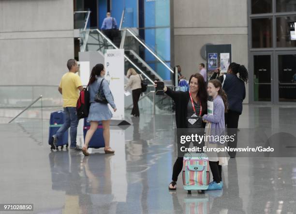 Guests taking a selfie during the 2018 edition of BookExpo America in New York City, New York, May 31, 2018.