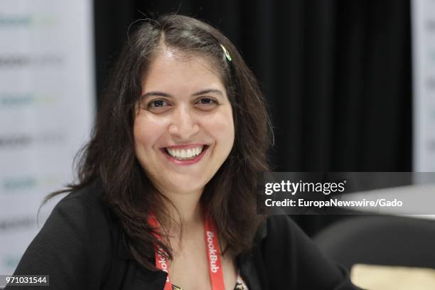 Half length portrait of author Afsaneh Moradian smiling, New York City, New York, May 31, 2018.