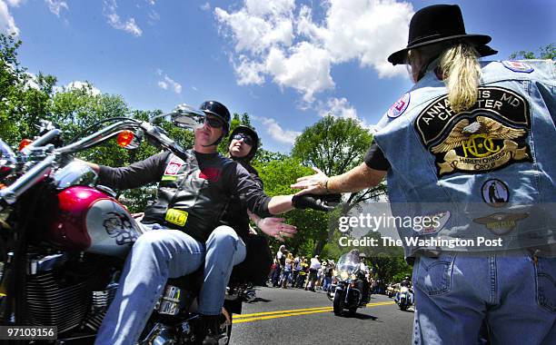 May 29, 2005 Slug: me-thunder Neg. #: 168771 Photographer: Gerald Martineau The Mall near Veitnam Wall memorial day activities Dan Garrity, right,...