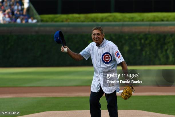 Hall of Fame football player Joe Namath throws out a ceremonial first pitch before the game between the Chicago Cubs and the Philadelphia Phillies on...