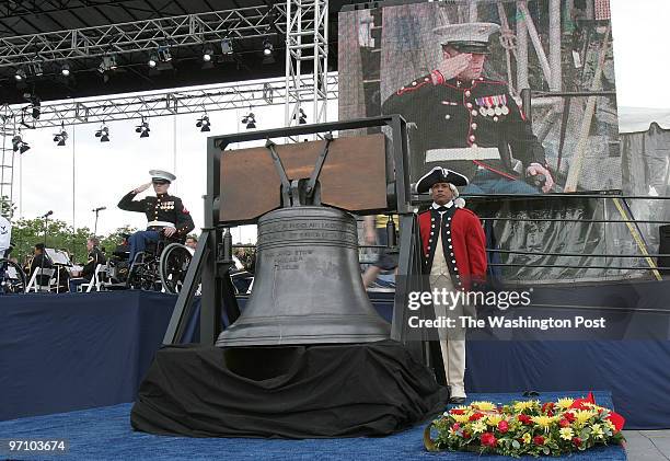 Washington, D.C., U.S. Marine Corps LCPL Kade Hinkhouse" pays tribute to his fellow marines during the Ringing of "The Spirit of the Liberty Bell,"...