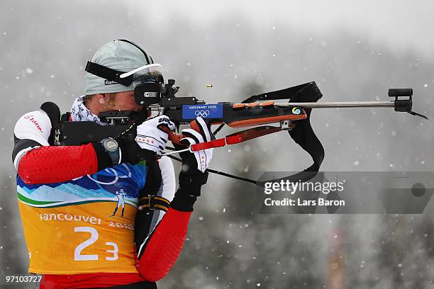 Dominik Landertinger of Austria shoots during the men's 4 x 7.5 km biathlon relay zeroing on day 15 of the 2010 Vancouver Winter Olympics at Whistler...