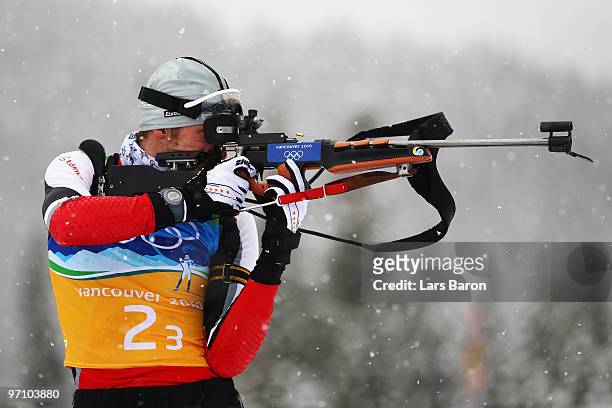 Dominik Landertinger of Austria shoots during the men's 4 x 7.5 km biathlon relay zeroing on day 15 of the 2010 Vancouver Winter Olympics at Whistler...