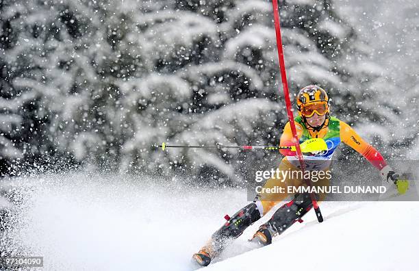 Canada's Brigitte Acton clears a gate during the Women's Vancouver 2010 Winter Olympics Slalom event at Whistler Creek side Alpine skiing venue on...