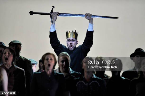 Georg Zeppenfeld as King Heinrich with artists of the company in Richard Wagner's Lohengrin directed by David Alden and conducted by Andris Nelsons...