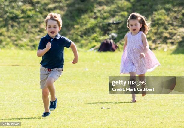 Princess Charlotte of Cambridge and Prince George of Cambridge during the Maserati Royal Charity Polo Trophy at Beaufort Park on June 10, 2018 in...