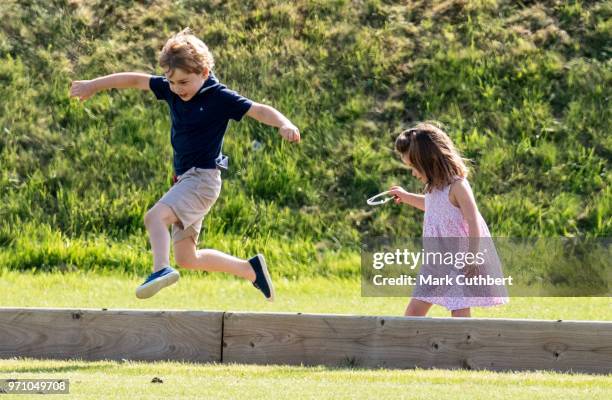 Prince George of Cambridge and Princess Charlotte of Cambridge during the Maserati Royal Charity Polo Trophy at Beaufort Park on June 10, 2018 in...