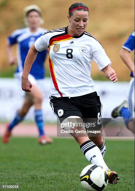 Inka Grings of Germany runs with the ball during the Woman's Algarve Cup match between Germany and Finland at the Estadio Belavista on February 26,...