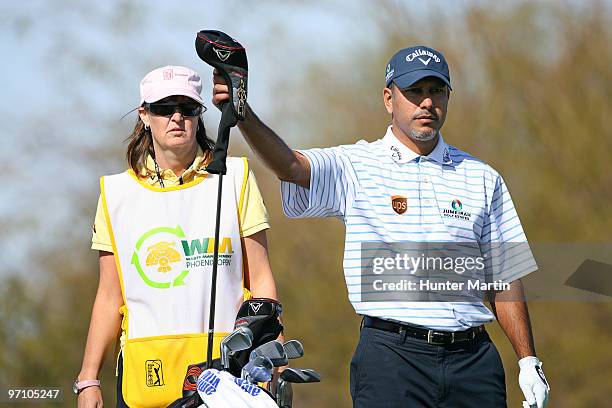 Jeev Milkha Singh of India pulls a club on the ninth hole during the second round of the Waste Management Phoenix Open at TPC Scottsdale on February...