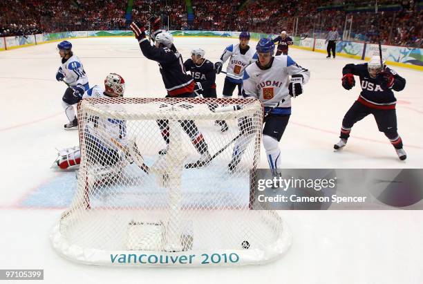 Ryan Malone of the United States celebrates after Patrick Kane of the United States scored during the ice hockey men's semifinal game between the...