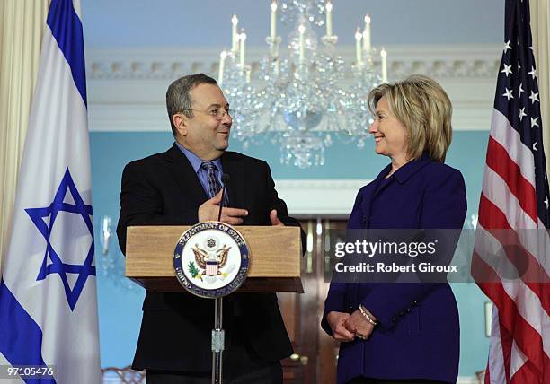 Israeli Defense Minister Ehud Barak speaks to the media as U.S. Secretary of State Hillary Clinton stand by on February 26, 2010 in Washington, DC....