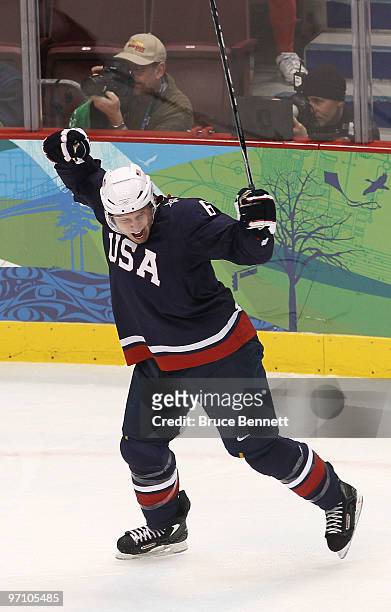 Erik Johnson of the United States celebrates scoring during the ice hockey men's semifinal game between the United States and Finland on day 15 of...