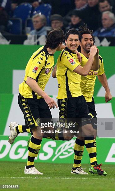 Nuri Sahin of Dortmund celebrates after he scores his team's opening goal during the Bundesliga match between FC Schalke 04 and Borussia Dortmund at...