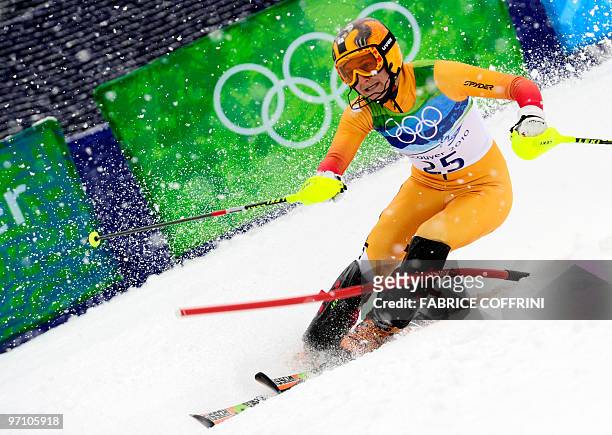 Canada's Brigitte Acton clears a gate during the Women's Vancouver 2010 Winter Olympics Slalom event at Whistler Creek side Alpine skiing venue on...
