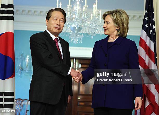 Secretary of State Hillary Clinton says a few words to the media after a bilateral meeting with South Korean Foreign Minister Yu Myung-hwan at the...