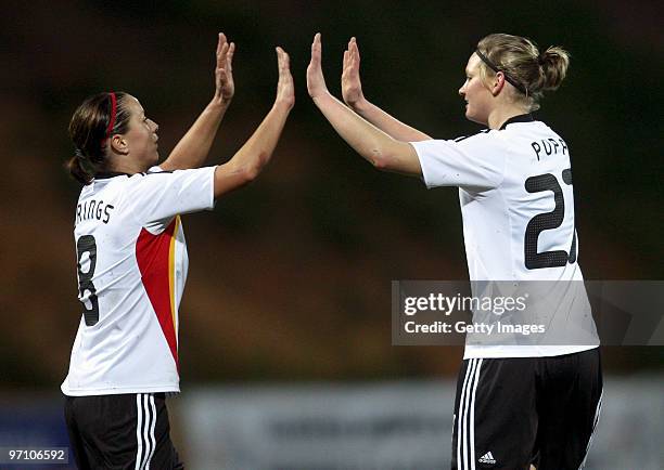 Alexandra Popp of Germany celebrateswith team mate Inka Grings during the Woman's Algarve Cup match between Germany and Finland at the Estadio...