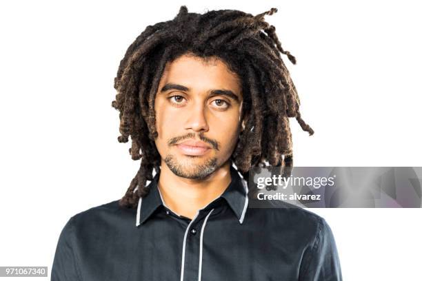 portrait of young man with afro hairstyle - rastafarian stock pictures, royalty-free photos & images