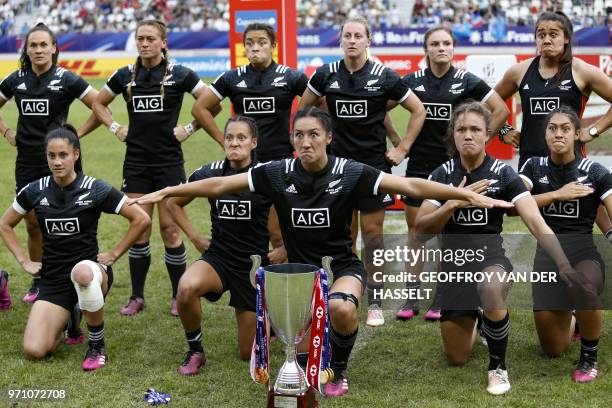 New Zealand's team celebrate with their trophy after winning the final of the Women's tournament of 2018 Rugby World Cup Sevens game between New...