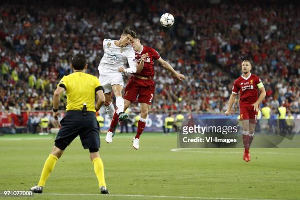 Cristiano Ronaldo of Real Madrid, James Milner of Liverpool FC, Jordan Henderson of Liverpool FC during the UEFA Champions League final between Real...