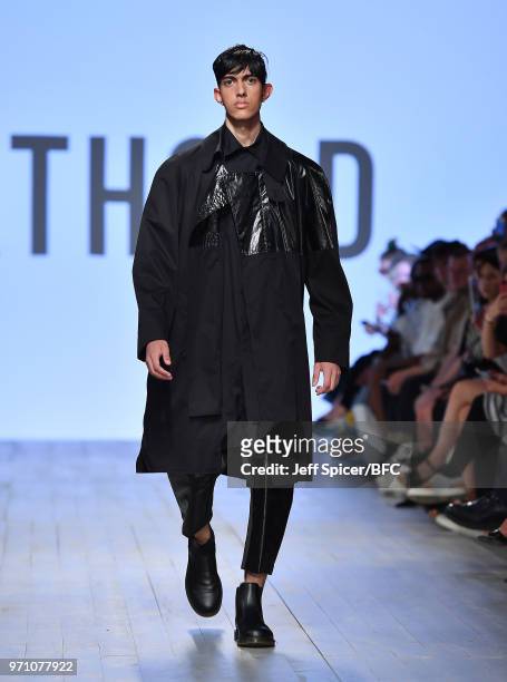 Model walks the runway at the Berthold show during London Fashion Week Men's June 2018 at the BFC Show Space on June 10, 2018 in London, England.