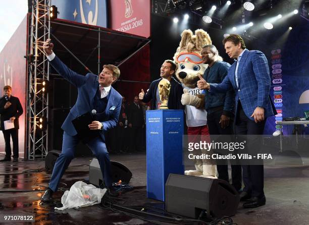 Aleksandr Kerzhakov, the Official Mascotte Zabivaka and Marcel Desailly pose for a photo during the official opening of the FIFA Fan Fest at...