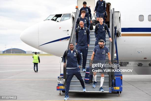 France's national football team goalkeeper Steve Mandanda, defender Adil Rami, midfielder Corentin Tolisso, defender Benjamin Pavard, defender Lucas...