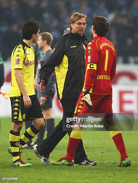 Head coach Juergen Klopp of Dortmund discusses with goalkeeper Roman Weidenfeller Bundesliga match between FC Schalke 04 and Borussia Dortmund at the...