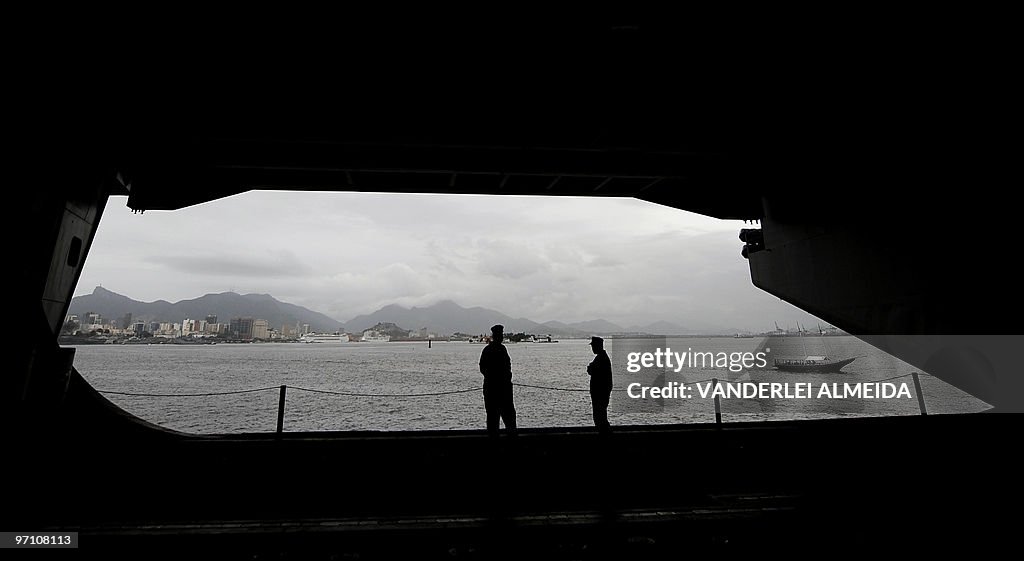 US marines on watch look at rhe city fro