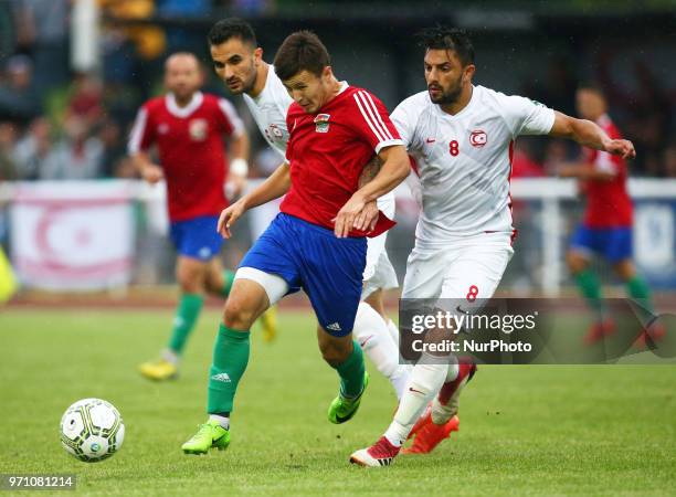 Bence Lizak of Karpatalya holds of Cagri Kiral of Northern Cyprus during Conifa Paddy Power World Football Cup 2018 Grand Final between Northern...