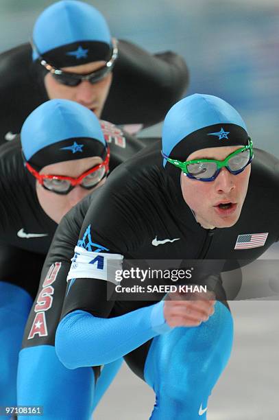 Brian Hansen competes with US team members in the Men's team pursuit speedskating quaterfinals at the Olympic Richmond Oval in Richmond outside...