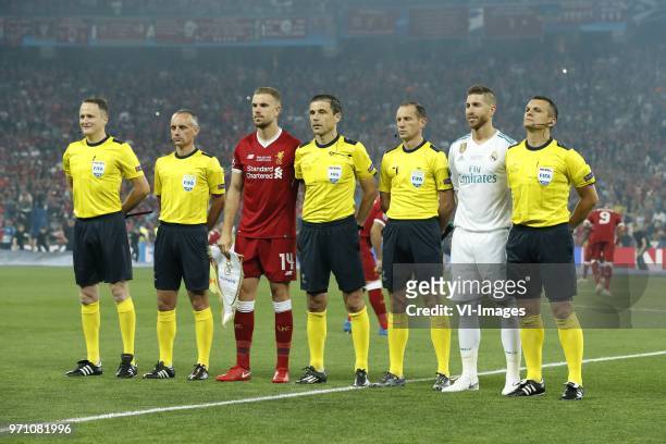 Additional assistant referee Danilo Grujic, assistant referee Dalibor Djurdjevic, Jordan Henderson of Liverpool FC, referee Milorad Mazic, assistant...
