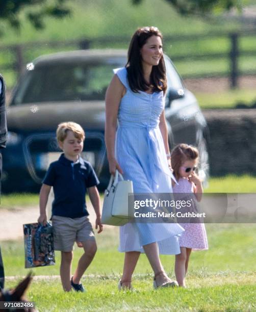 Catherine, Duchess of Cambridge with Prince George of Cambridge and Princess Charlotte of Cambridge during the Maserati Royal Charity Polo Trophy at...