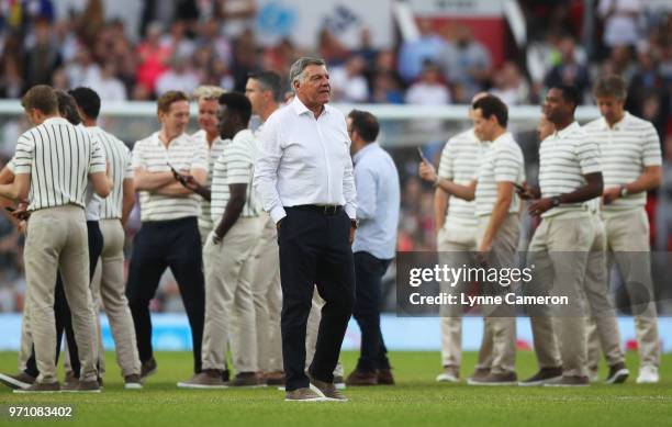 Sam Allardyce manager of England walks on the pitch prior to the Soccer Aid for UNICEF 2018 match between England and the Rest of the World at Old...