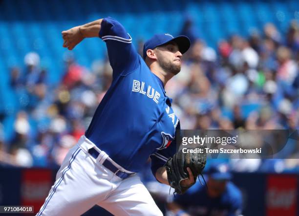 Marco Estrada of the Toronto Blue Jays delivers a pitch in the first inning during MLB game action against the Baltimore Orioles at Rogers Centre on...