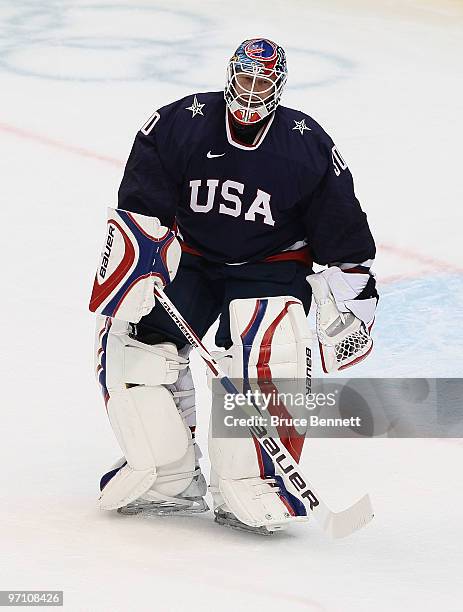 Goalkeeper Ryan Miller of the United States is replaces by goalkeeper Tim Thomas of the United States during the ice hockey men's semifinal game...