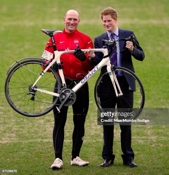 Lawrence Dallaglio poses with Prince Harry after he and other cyclists rode more than 1700km through Europe on the Dallaglio Cycle Slam at Twickenham...