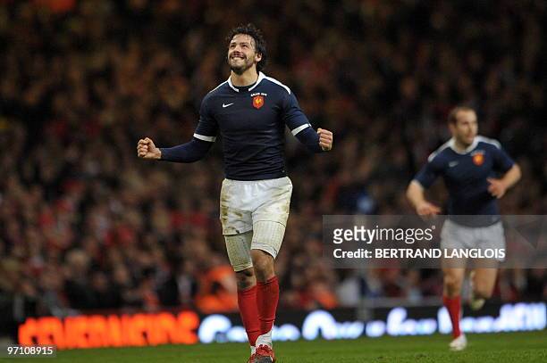 France's Clement Poitrenaud celebrates after France's Frederic Michalak scored a penalty kick during the RBS Six Nations International rugby union...