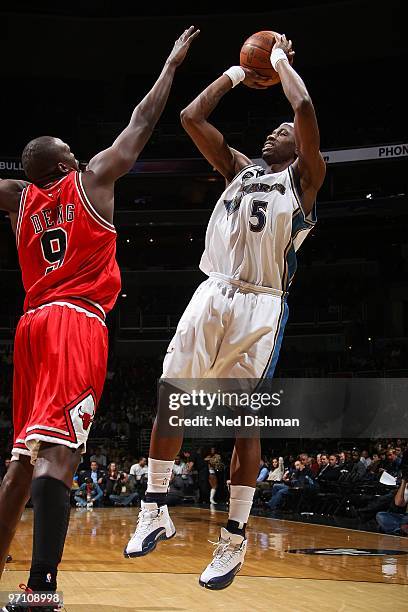 Josh Howard of the Washington Wizards shoots against Luol Deng of the Chicago Bulls during the game on February 22, 2010 at the Verizon Center in...