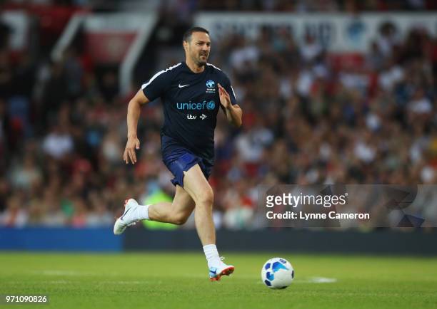 Paddy McGuinness of England warms up prior to the Soccer Aid for UNICEF 2018 match between England and the Rest of the World at Old Trafford on June...
