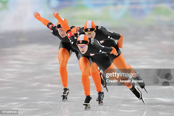 Renate Groenewold, Diane Valkenburg and Ireen Wust of team Netherlands compete in the Ladies' Team Pursuit Speed Skating Quarter-Finals on day 15 of...