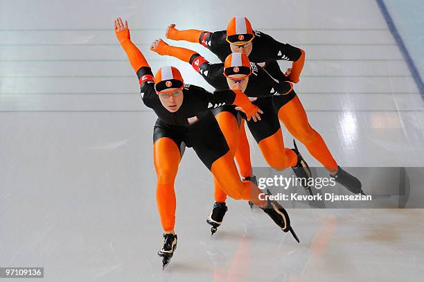 Renate Groenewold, Diane Valkenburg and Ireen Wust of team Netherlands compete in the Ladies' Team Pursuit Speed Skating Quarter-Finals on day 15 of...