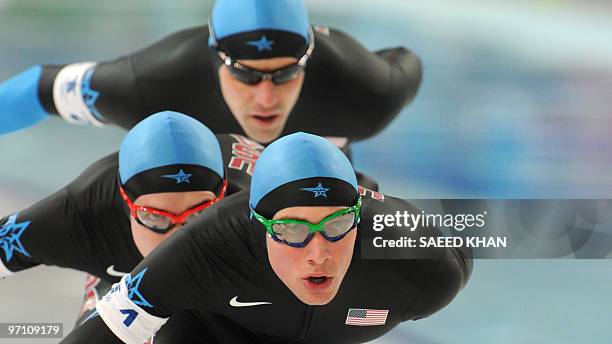 Brian Hansen competes with US team members in the Men's team pursuit speedskating quaterfinals at the Olympic Richmond Oval in Richmond outside...