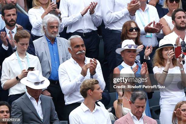 Jean-Paul Belmondo, Isabelle Huppert and Mansour Bahrami attend the Men Final of the 2018 French Open - Day Fithteen at Roland Garros on June 10,...